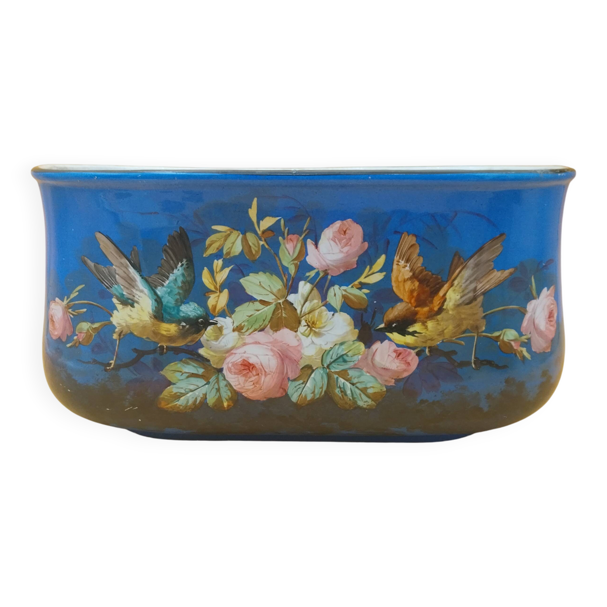 Paris porcelain jardinière with floral and bird decoration, 19th century.