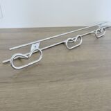Large vintage wall-mounted coat rack in chrome metal
