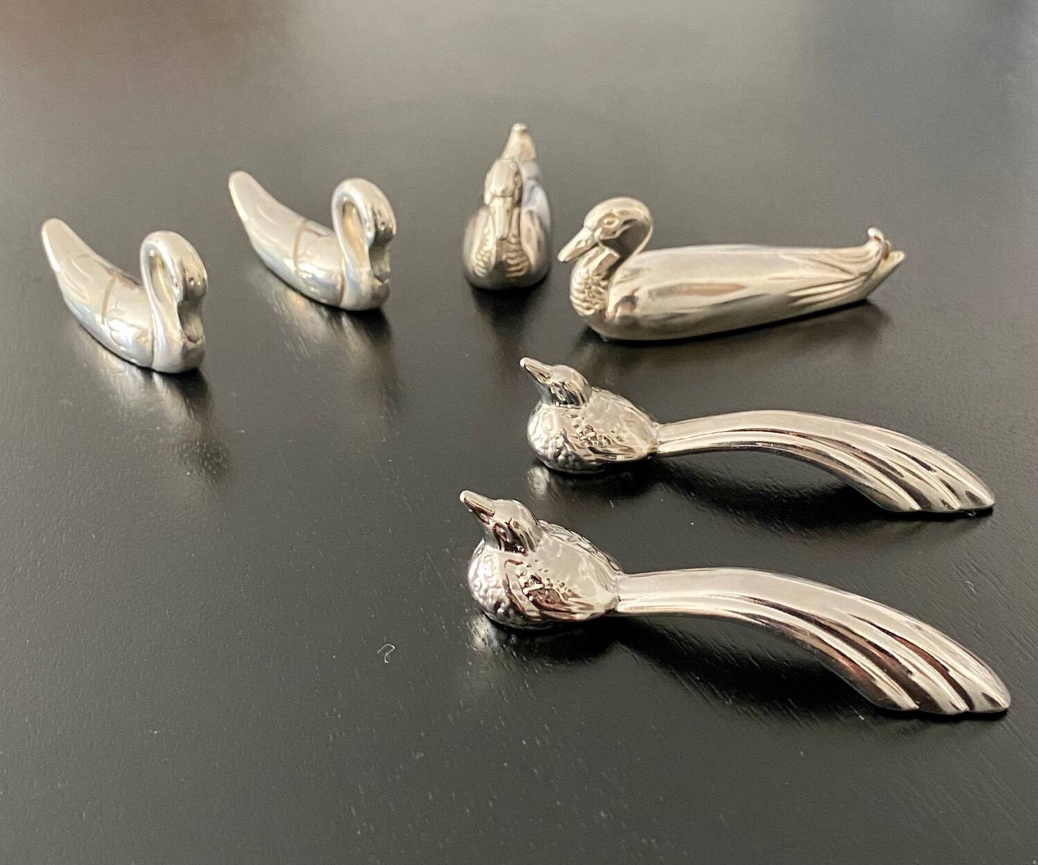 6 various animal shaped knife holders in silver metal