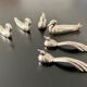6 various animal shaped knife holders in silver metal