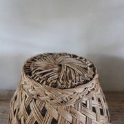 Vintage high round wicker basket with openwork.