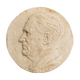 Old plaster medallion, man profile
