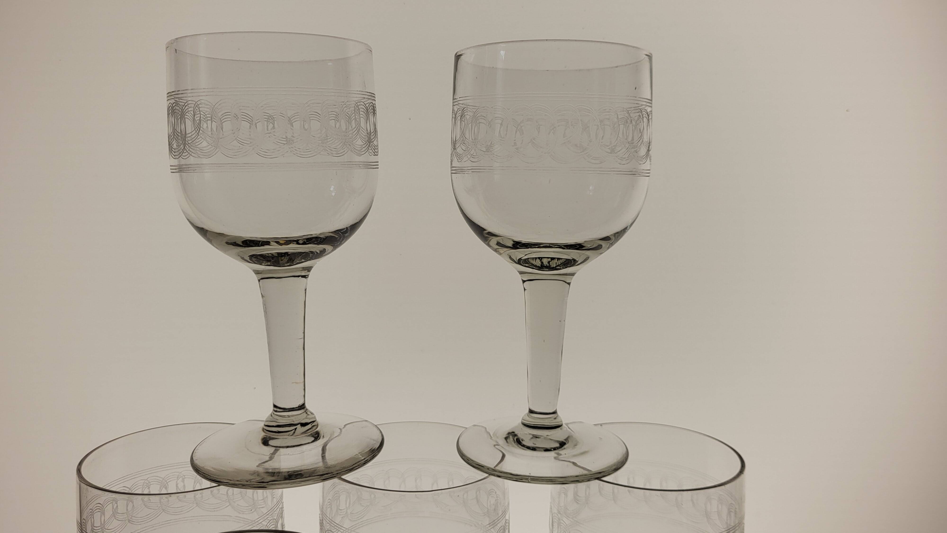 7 19th century guilloche wine/water glasses