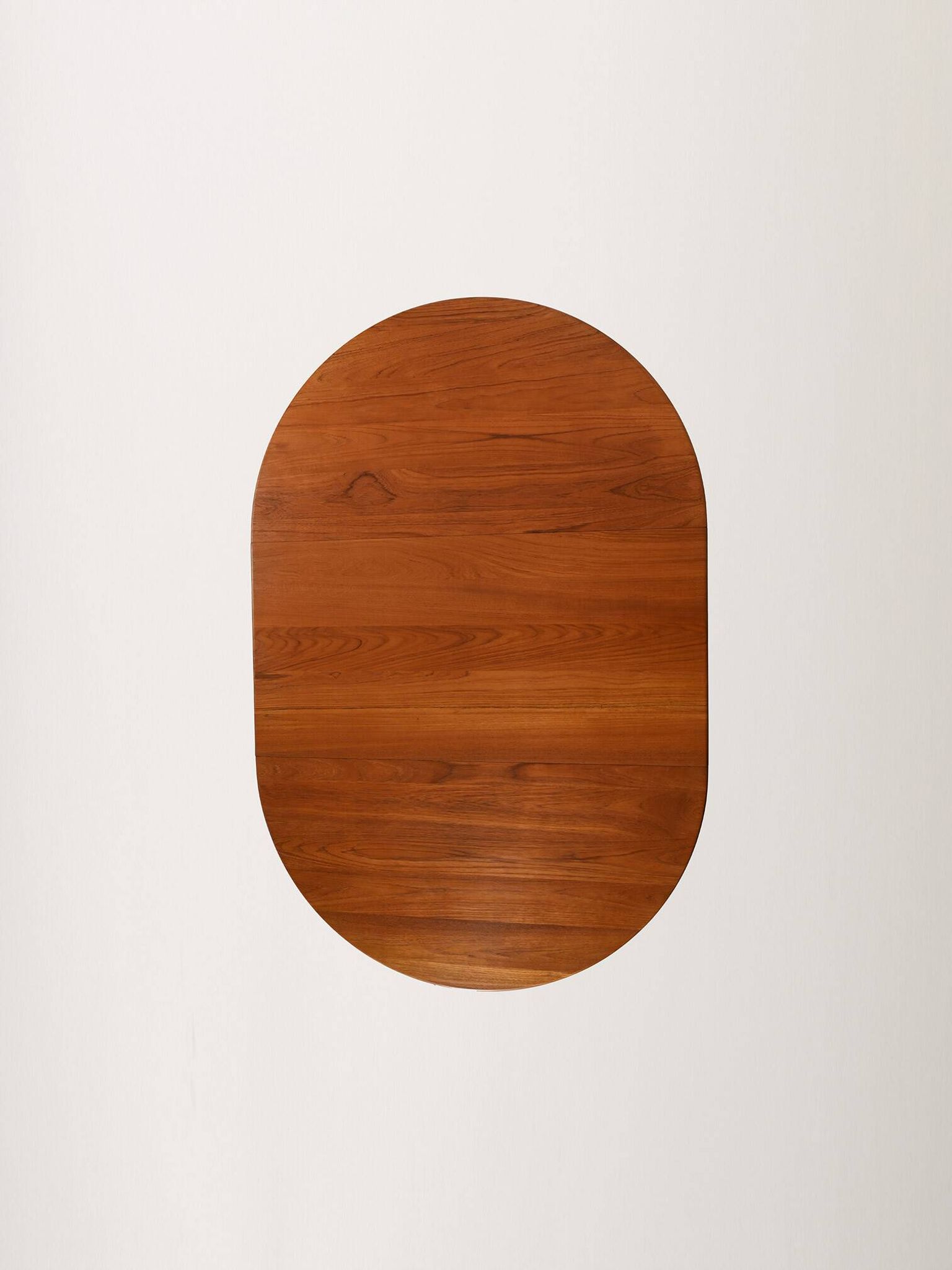 Round extendable teak table by Svante Skogh