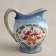 Earthenware milk jug