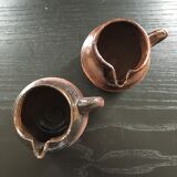 Pair of sandstone pitchers