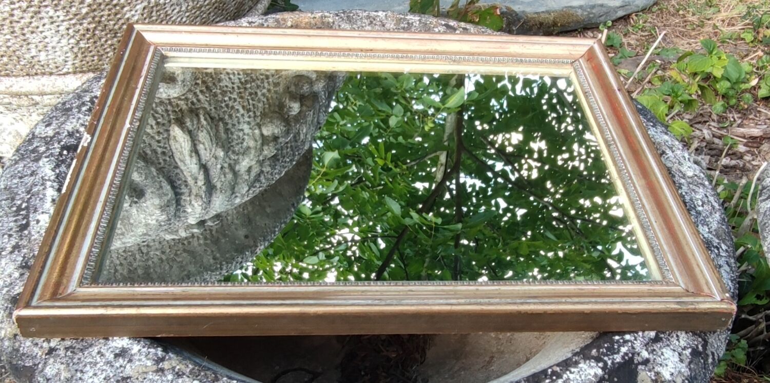 Old little gilded mirror
