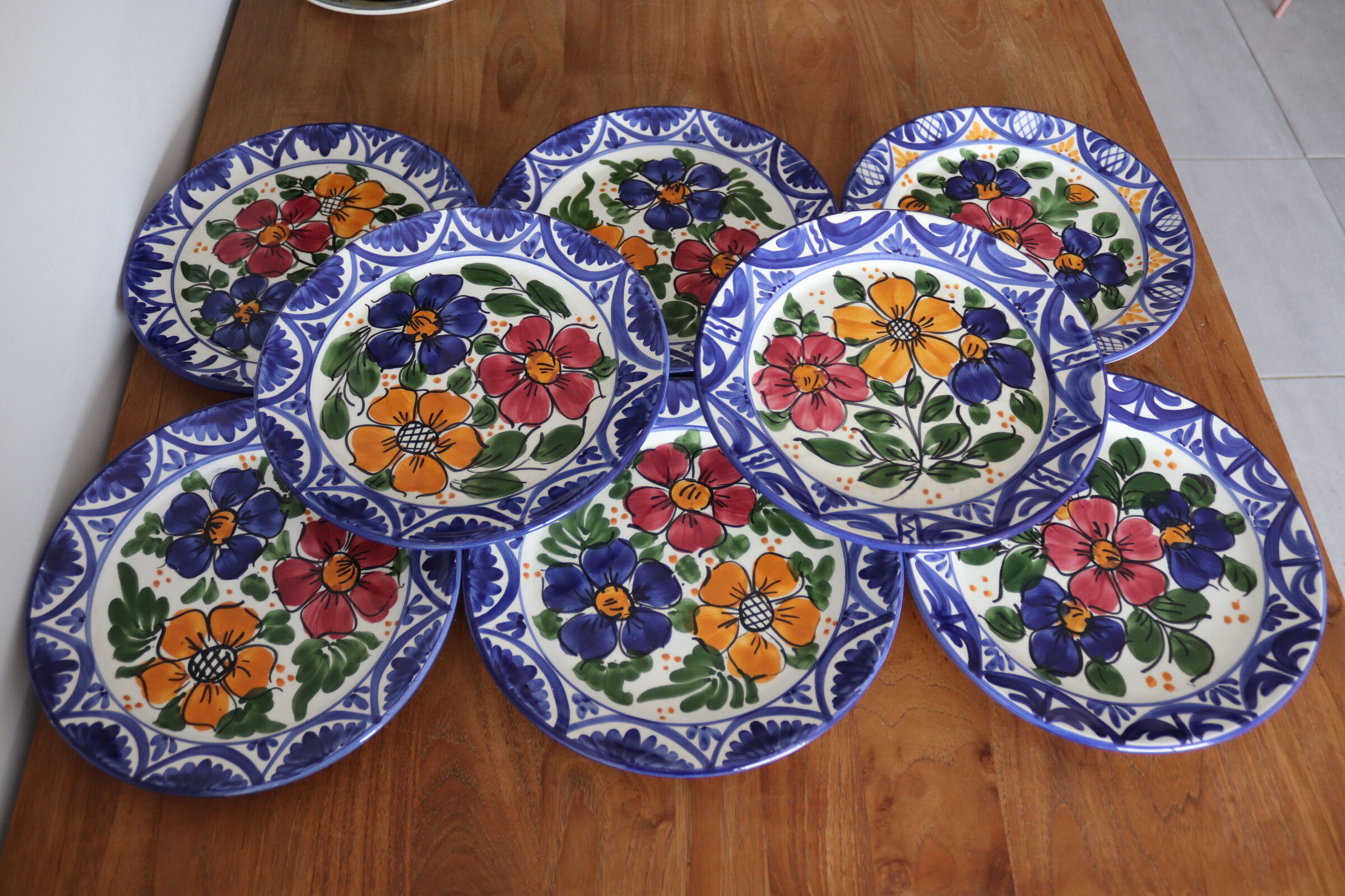 8 hand-painted plates