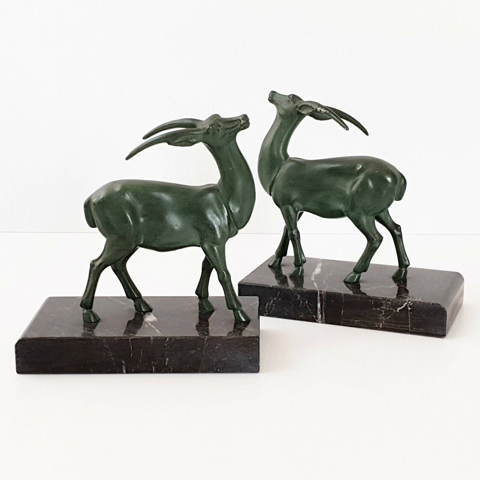 Pair of vintage ibex bookends from 1940-1950 in marble and metal.