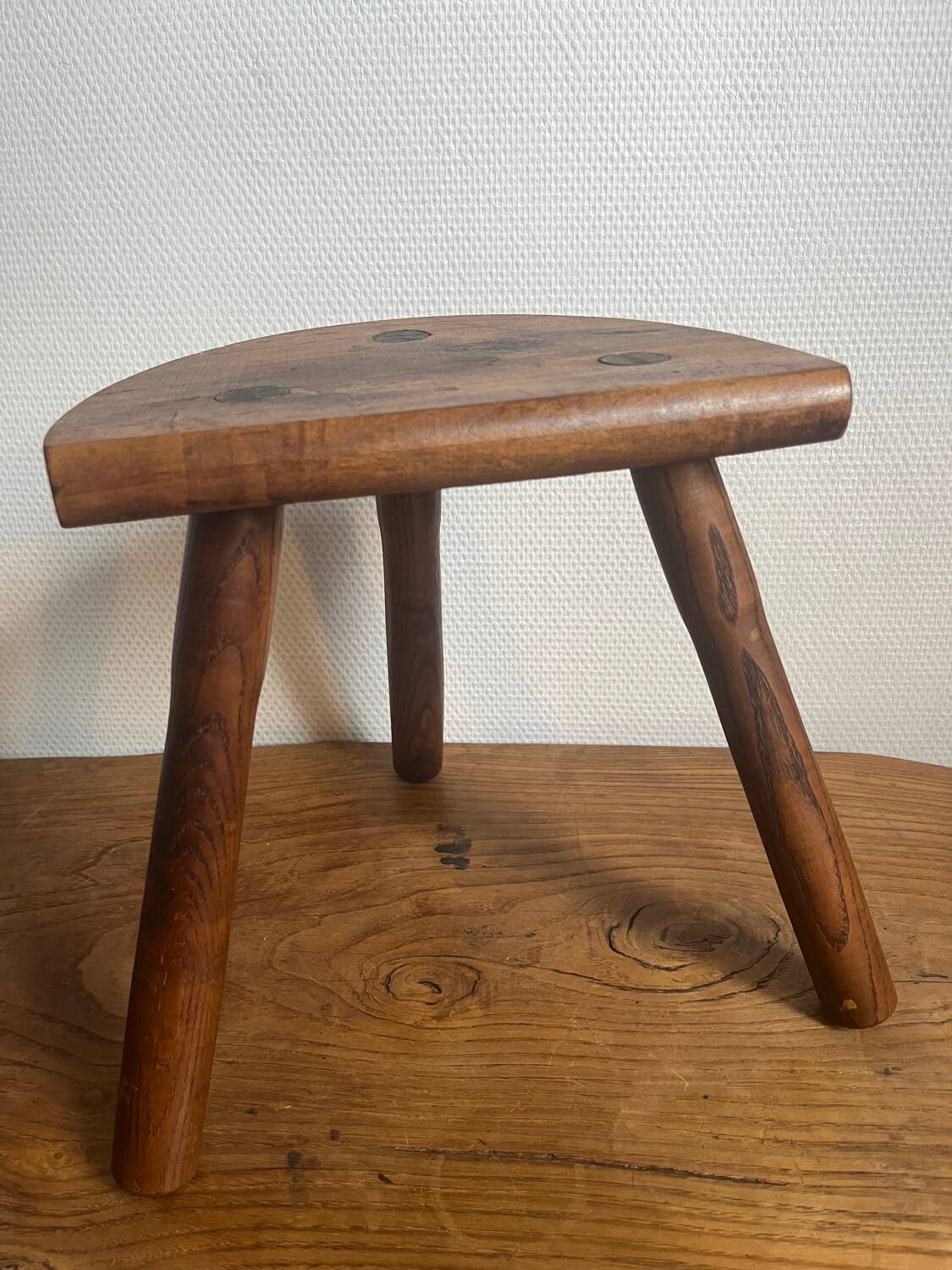 Wooden tripod stool