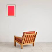 Brutalist armchair in oak and leather by Tage Poulsen, Denmark, 1970s.