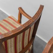 Pair of Parisian-style armchairs in wood with striped fabric armrests, vintage