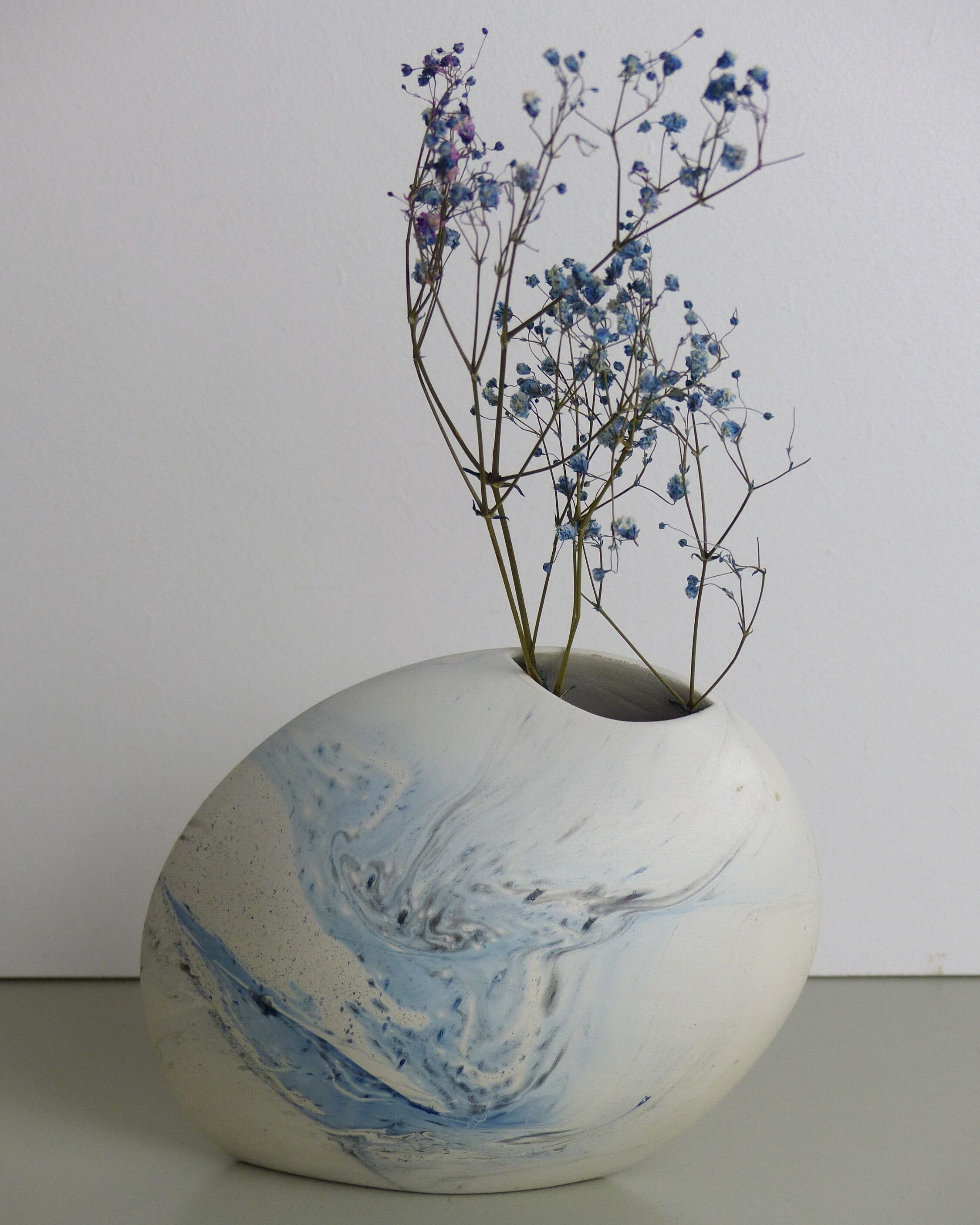 White and blue oval vase