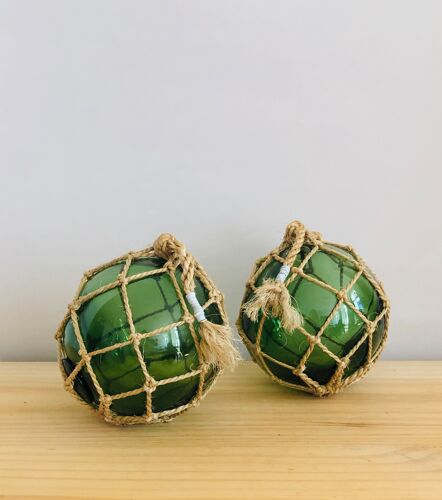 Pair of fishing floats and glass and rope