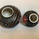 Pair of matte and glazed ceramic vases