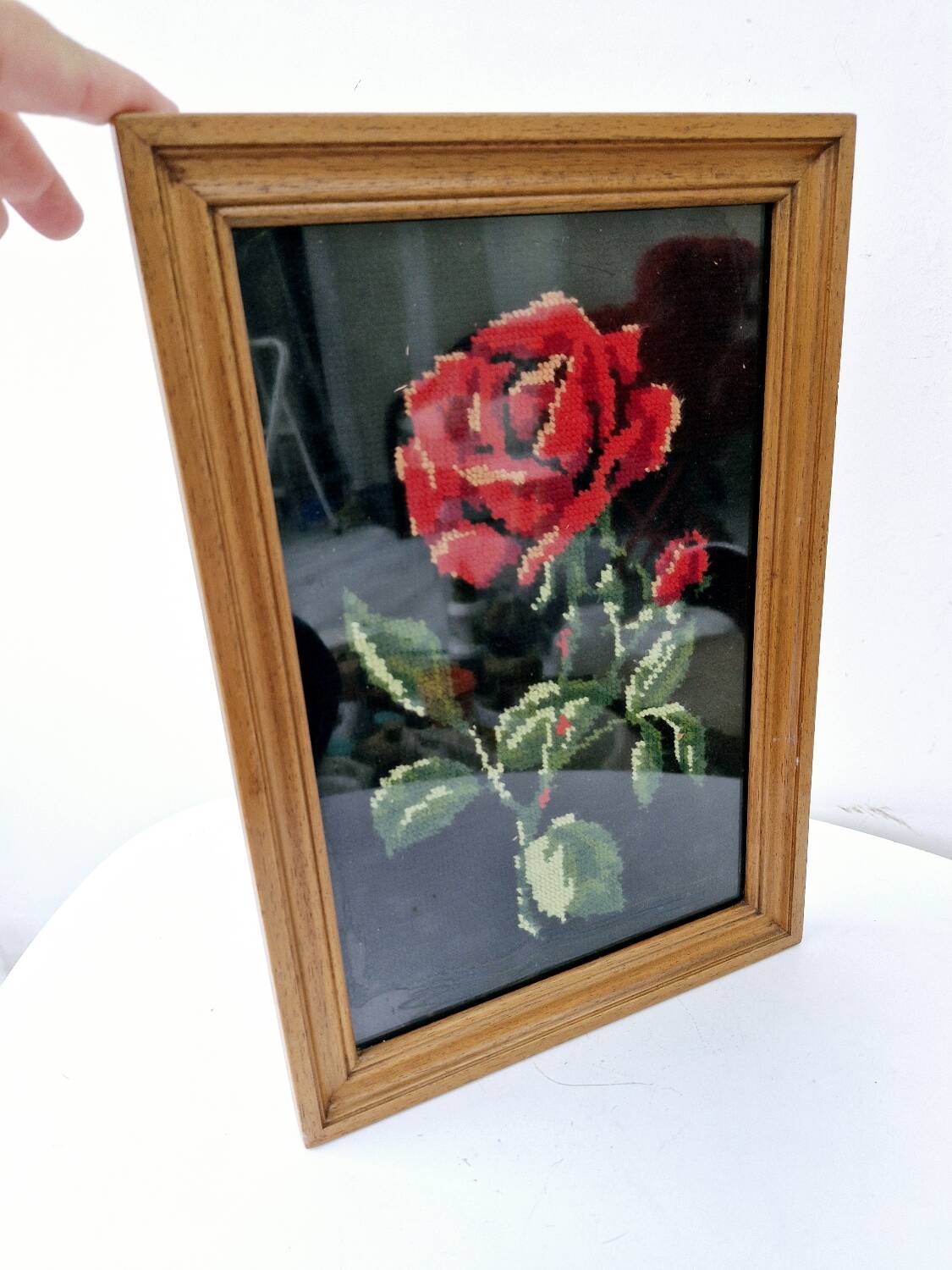 Canvas under vintage pink frame on black background