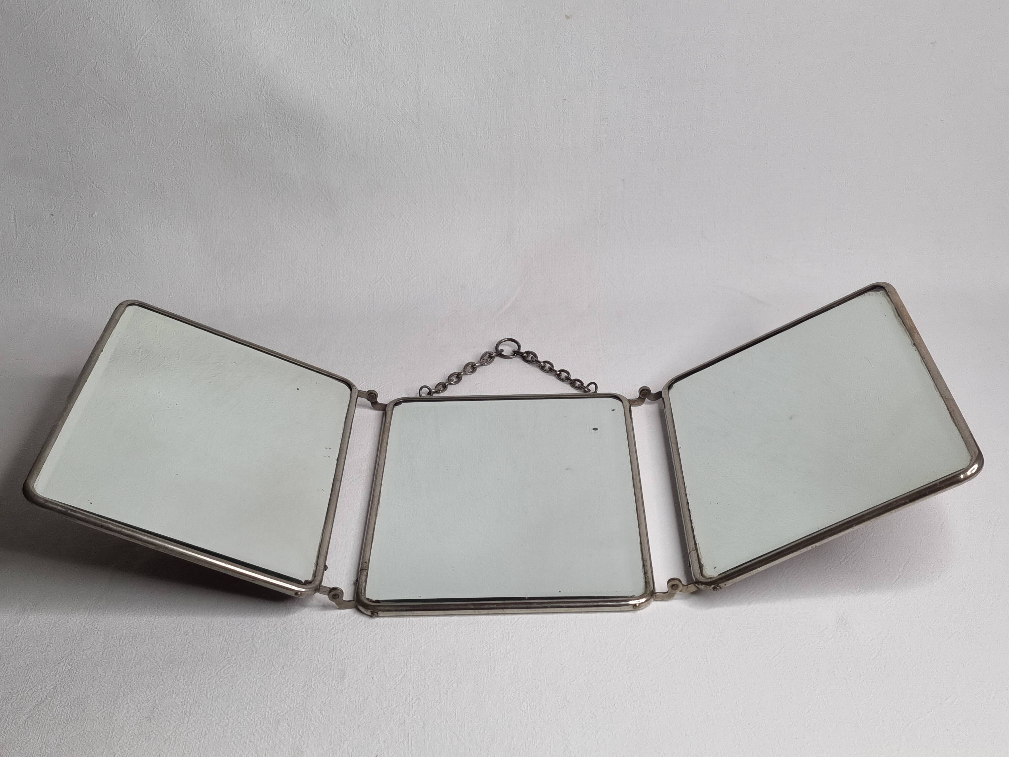 Antique triptych barber's mirror, metal frame and imitation leather back, 1930