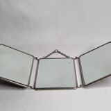 Antique triptych barber's mirror, metal frame and imitation leather back, 1930