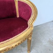 Louis XVI gilt wood and red velvet armchair