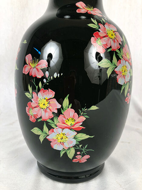 Black opal vase decorated with flowers