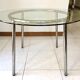 Table ronde design 1970 en verre et métal