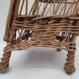 child's or doll's armchair in light woven wicker