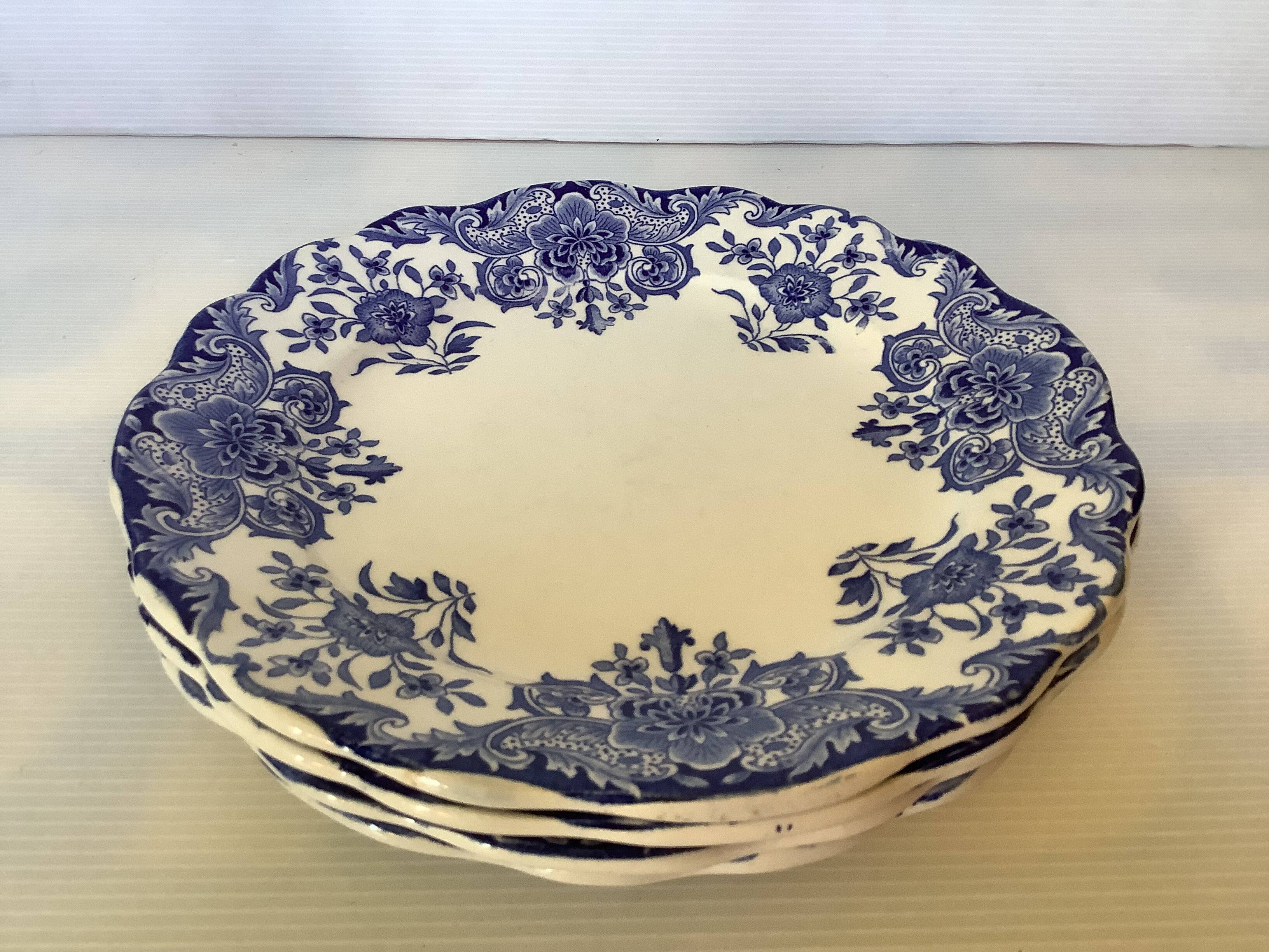 Four old Boch Brothers Dordrecht plates