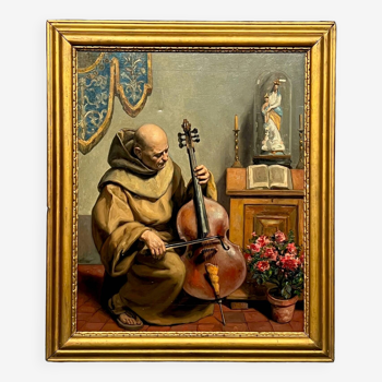 Tableau signé «Moine jouant du violoncelle».
