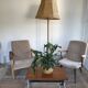 Wooden side table with chrome frame on wheels