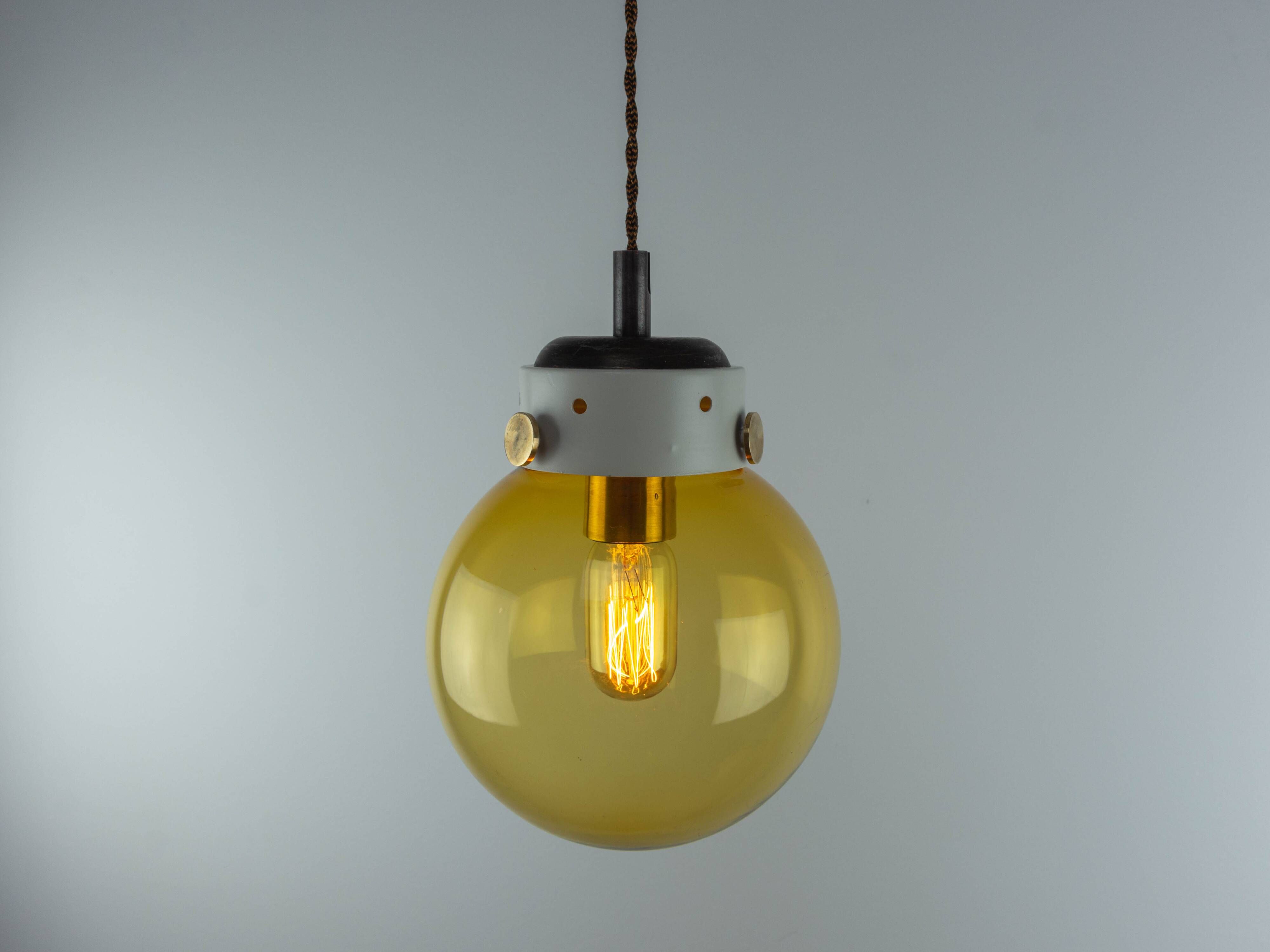 Vintage Mid-Century Modern Industrial Amber Glass And Brass Metal Lamp