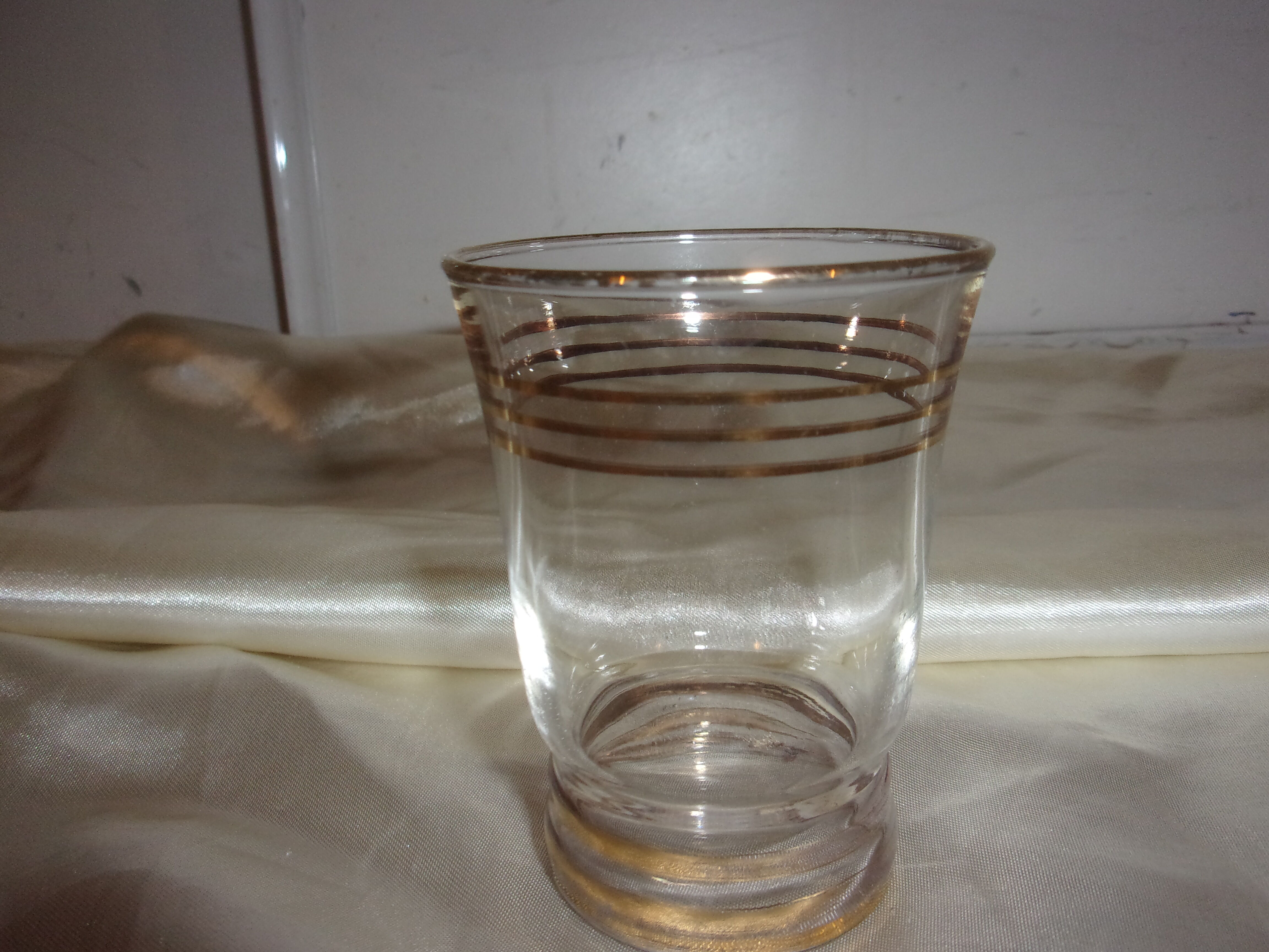 Service in glass pitcher and 10 glasses