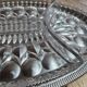 Vintage silver-plated metal tray with a segmented glass aperitif dish.
