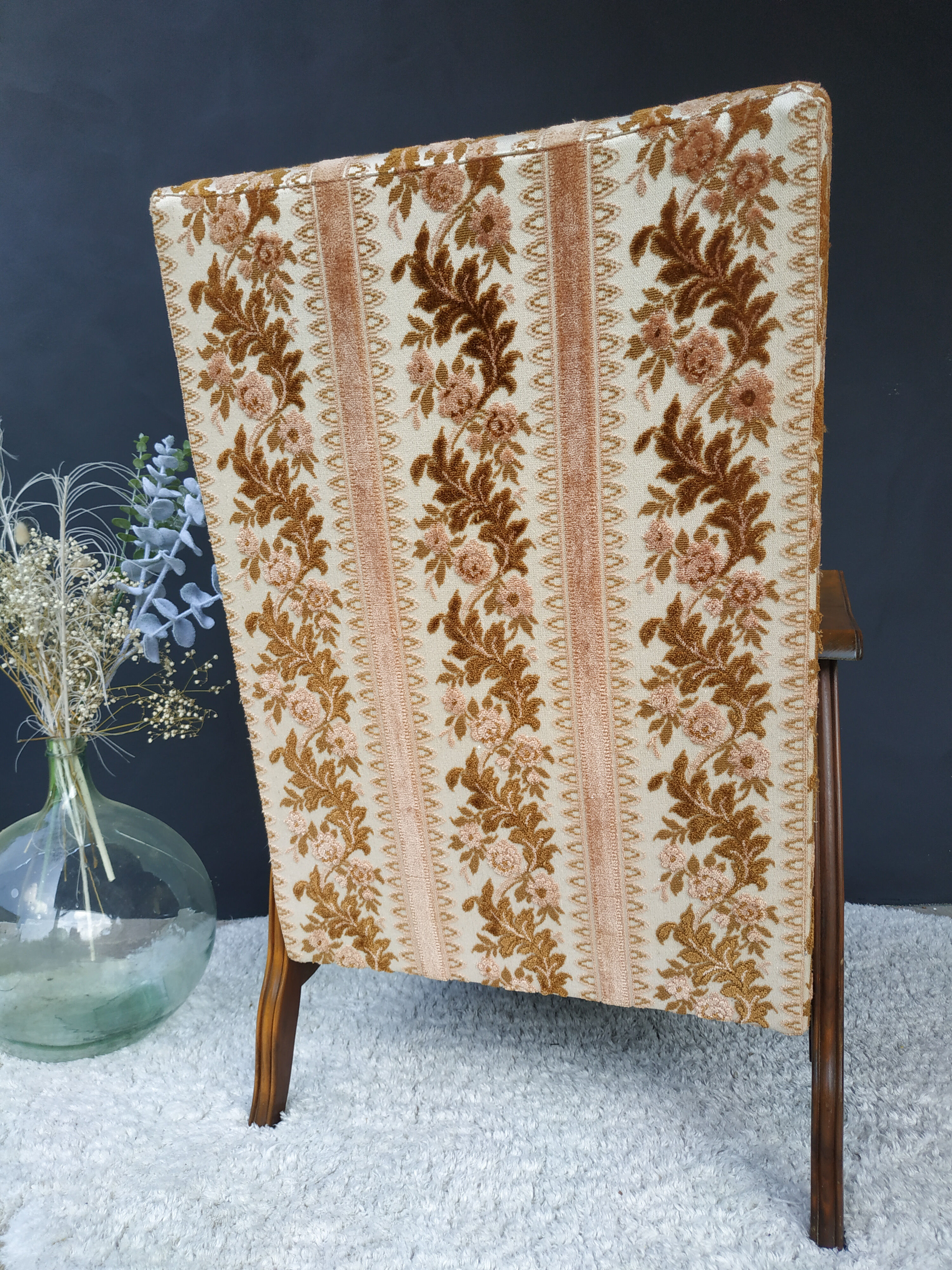 Floral-patterned velvet armchair
