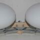 Pair of 60s wall lights in metal and opaline