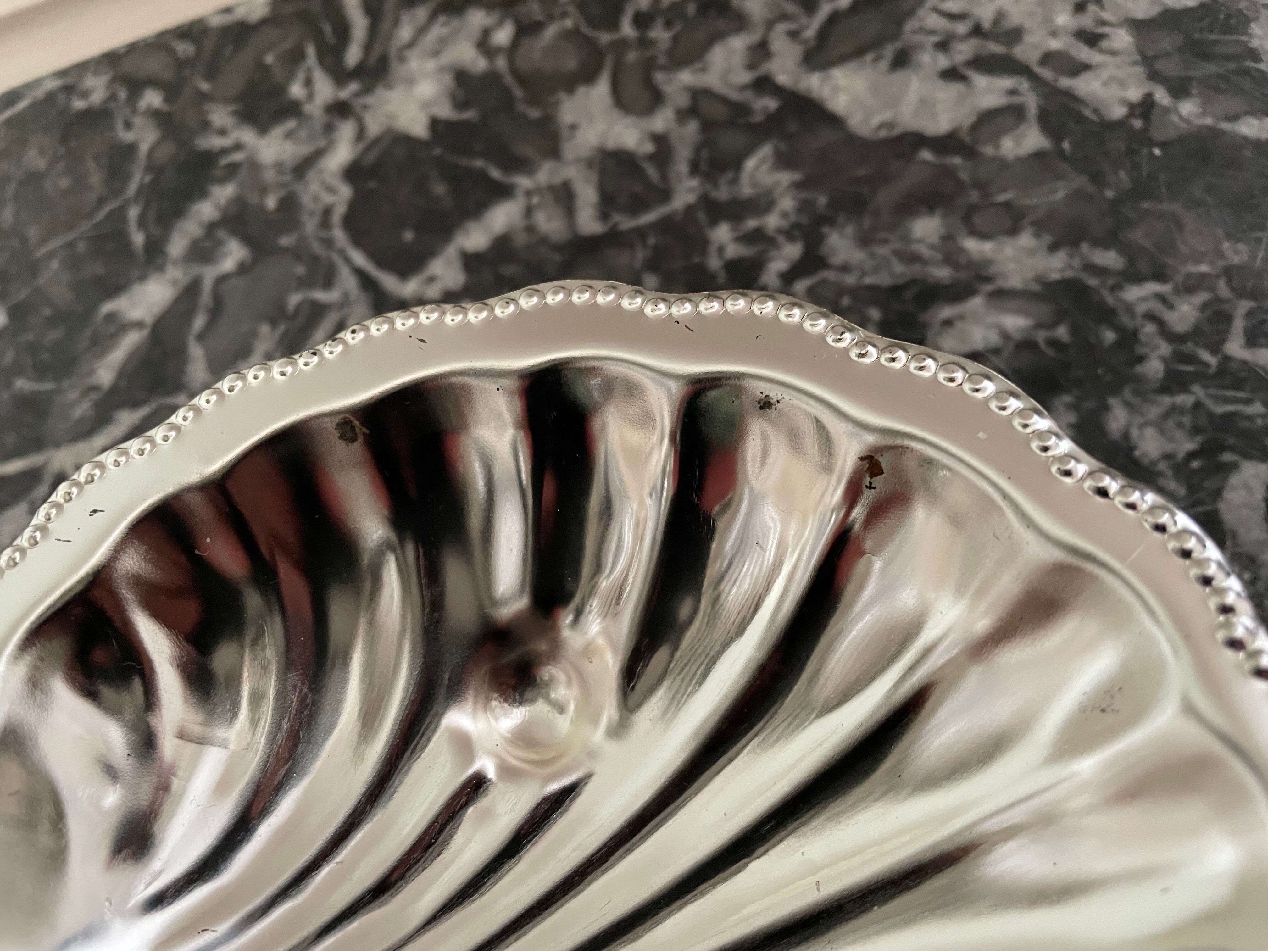 Shell-shaped metal butter dish