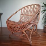 Vintage rattan armchair original shell shape