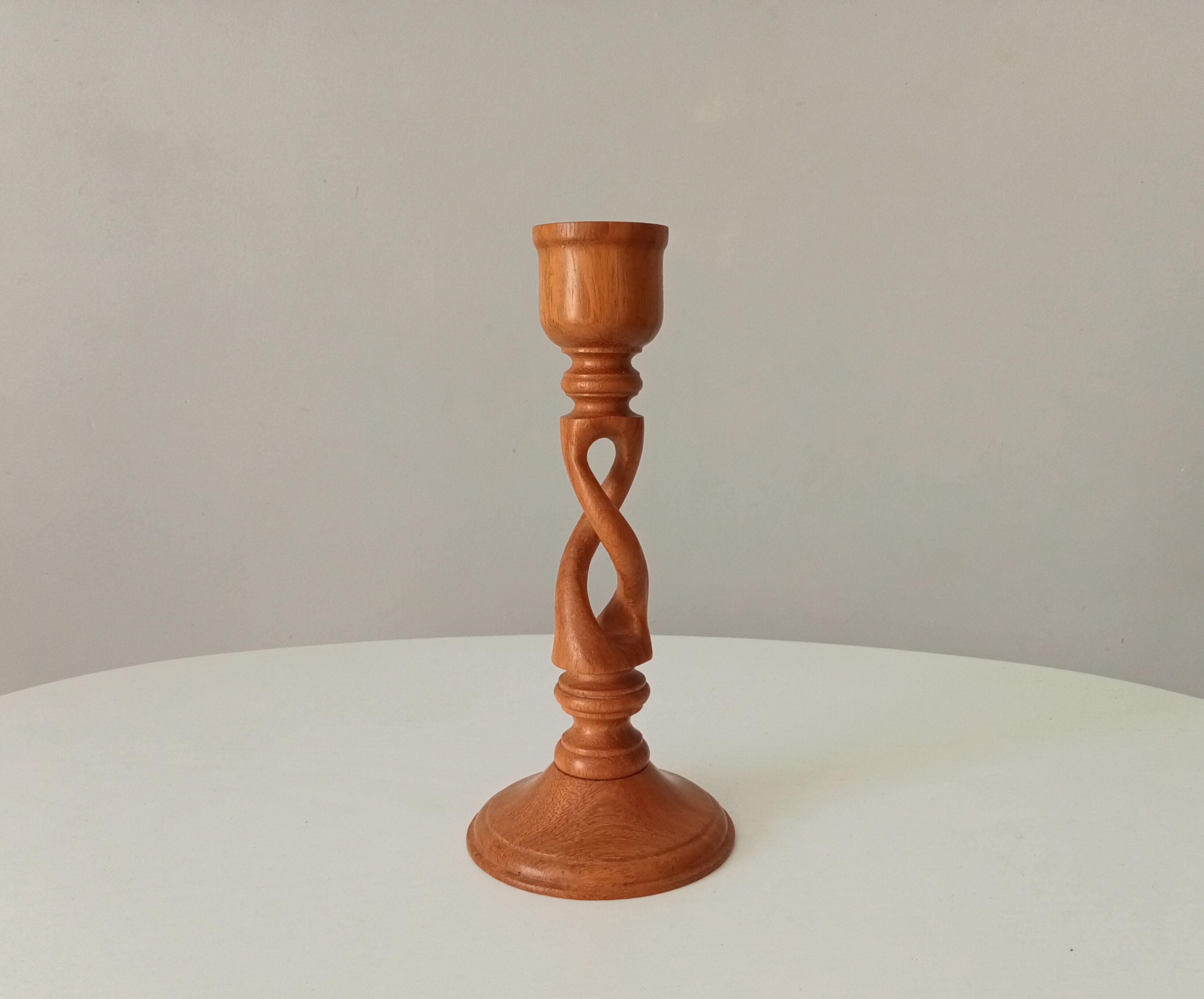 Vintage candle holder in carved wood