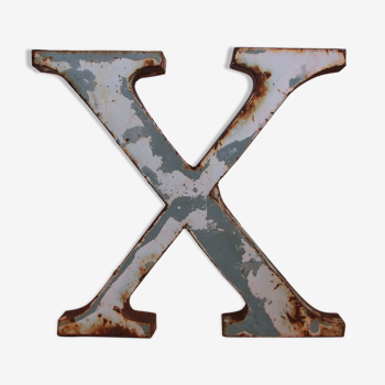 Old sign letter X