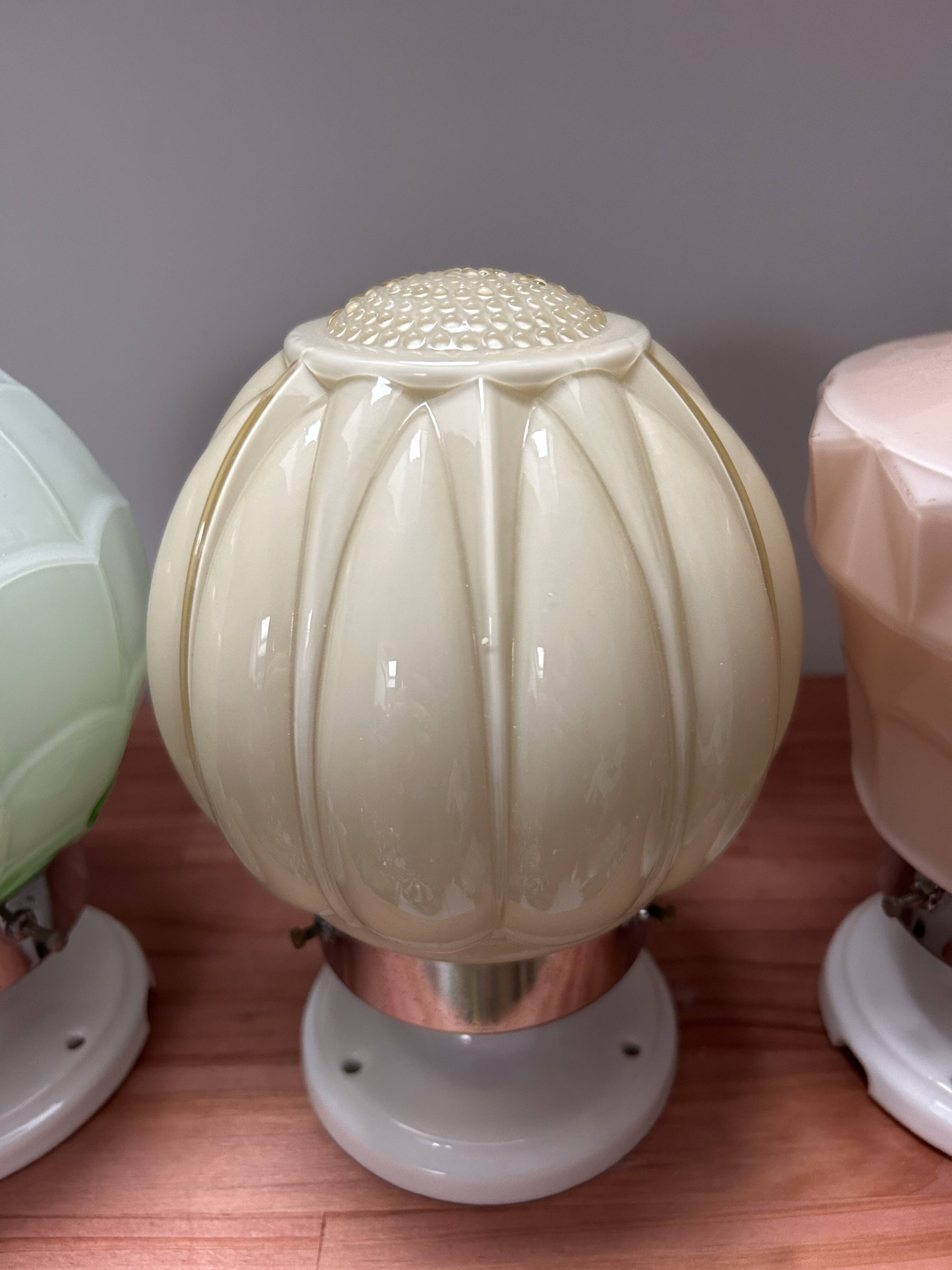 Set of three Thabur globe wall lights in pastel opaline