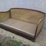 Former caned wood sofa