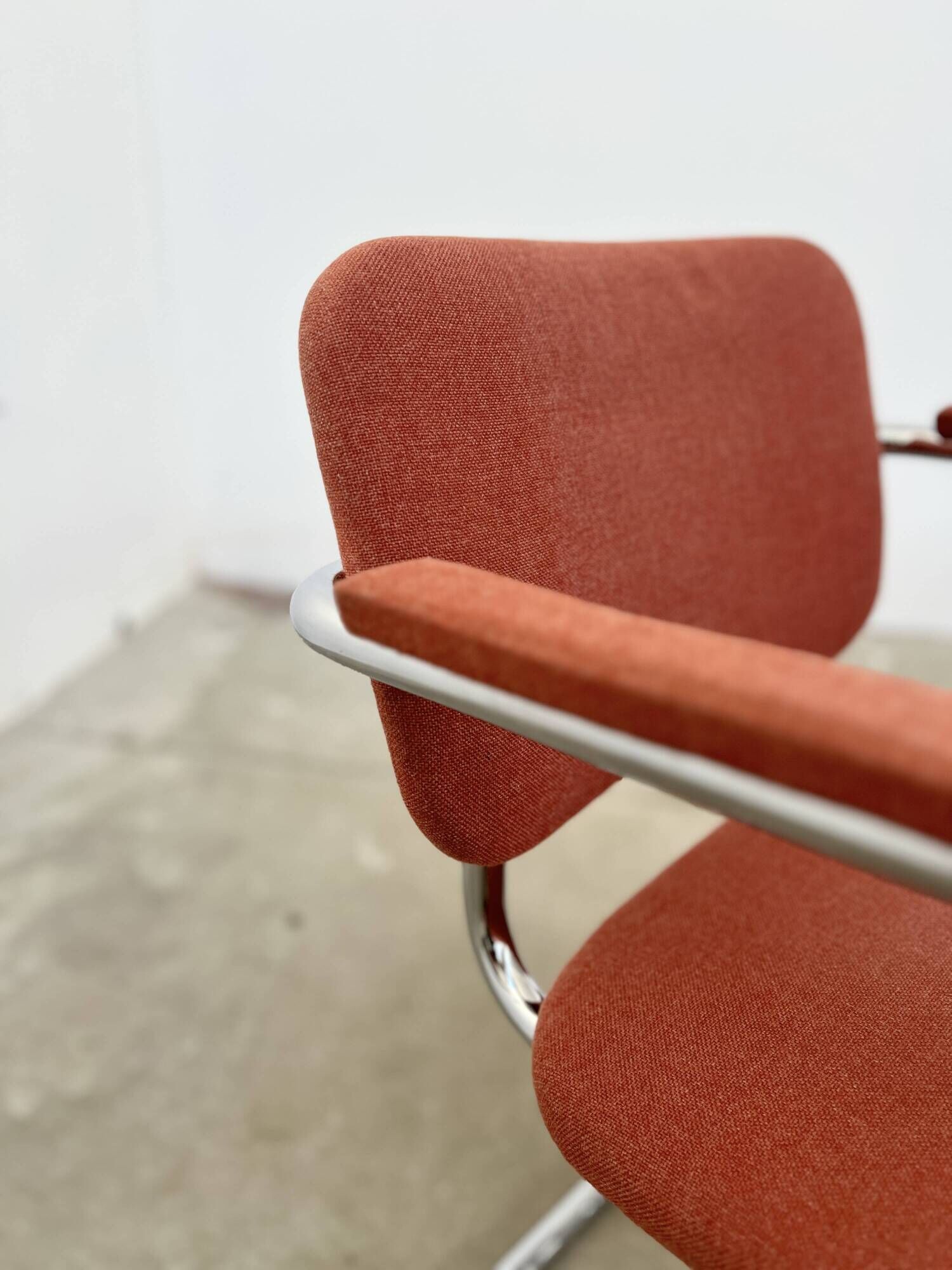 Pair of Marcel Breuer B64 Knoll armchairs in coral fabric
