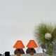 Pair of orange turned wood lamps