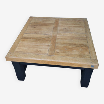 Raw and black wood coffee table