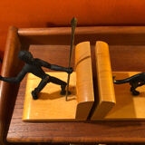 Art Deco bronze and sycamore bookends pair