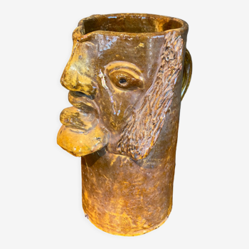 Anthropomorphic glazed ceramic pitcher