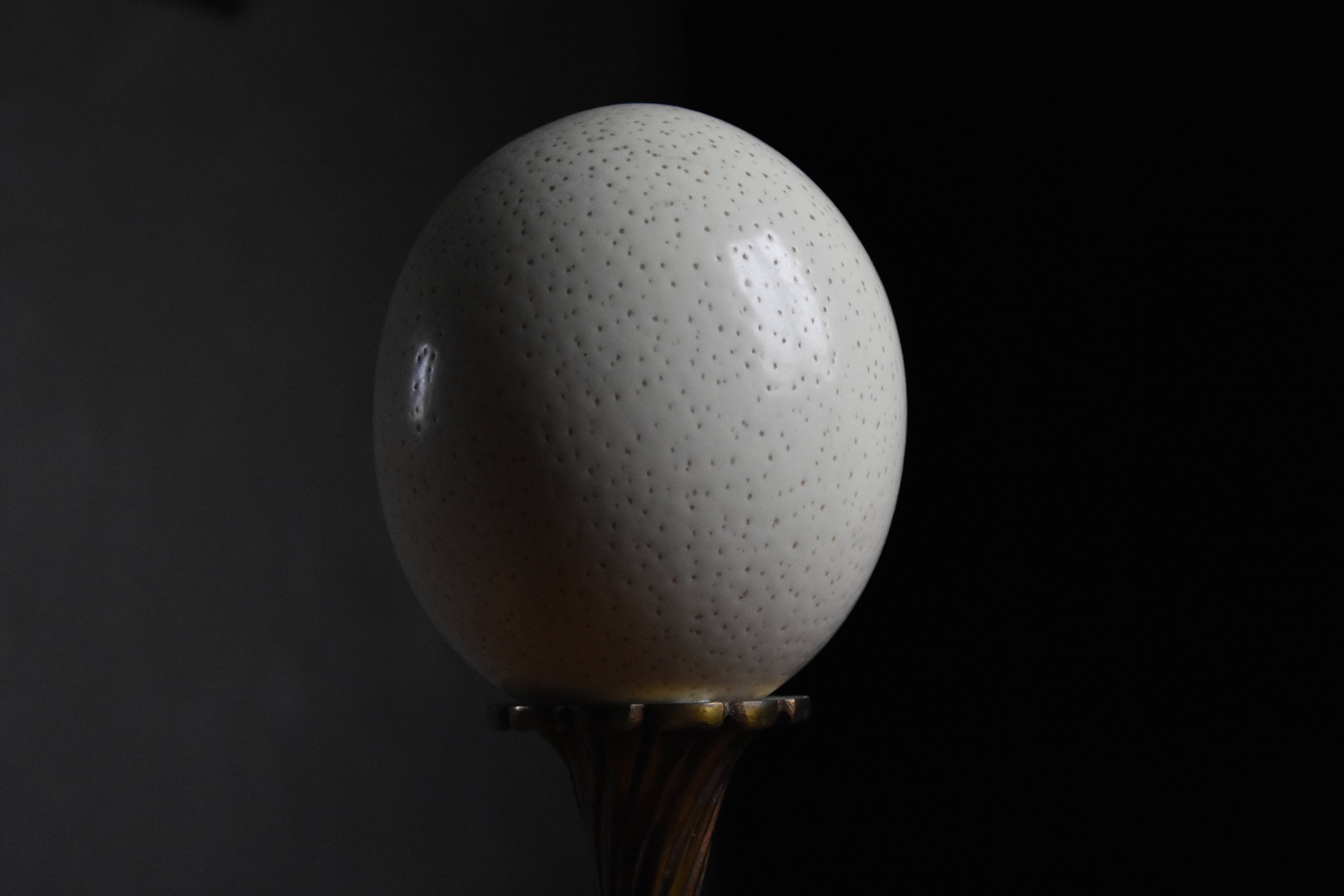 Ostrich egg on brass base