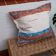 Handwoven cushion cover made from recycled cotton