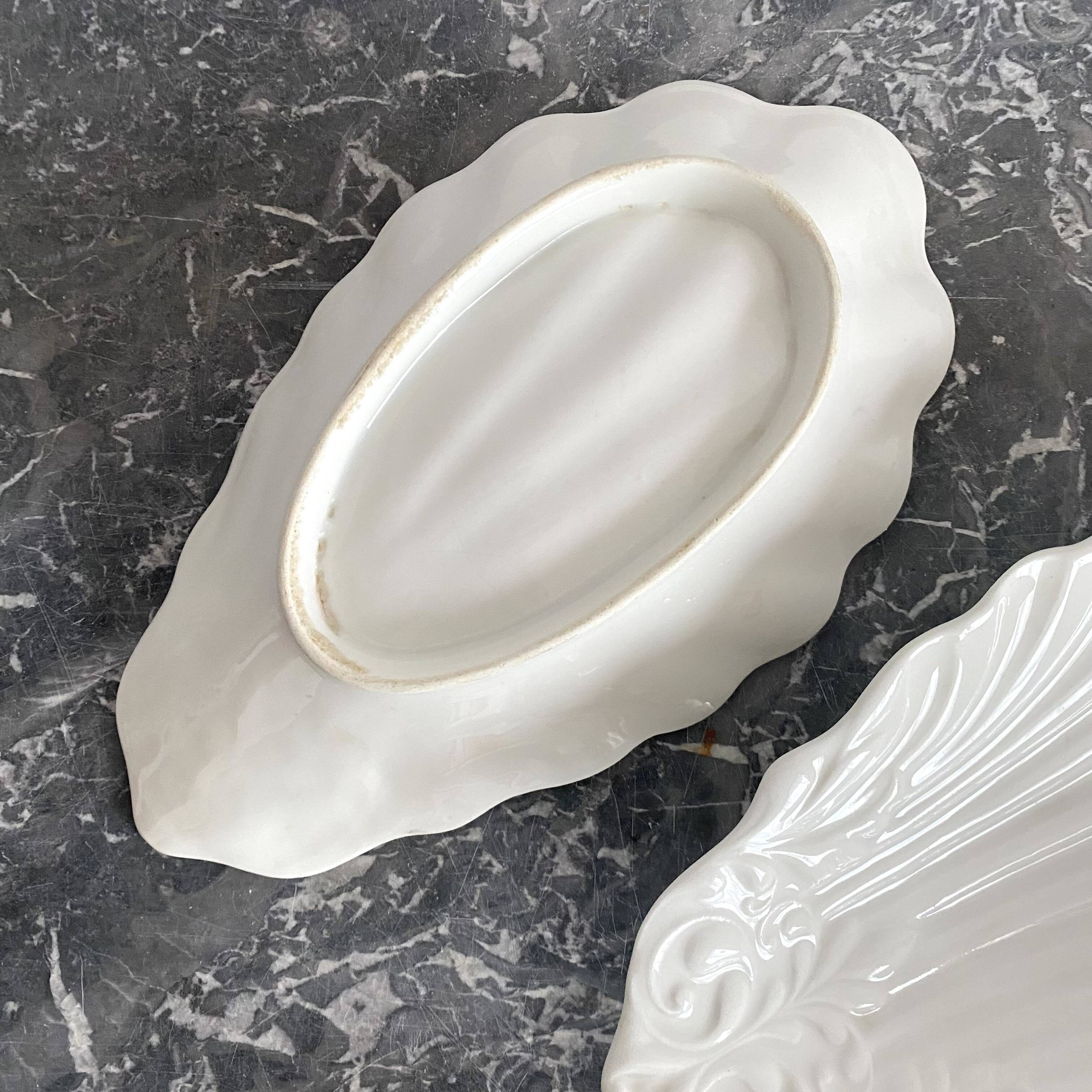 porcelain shell bowls, empty pocket