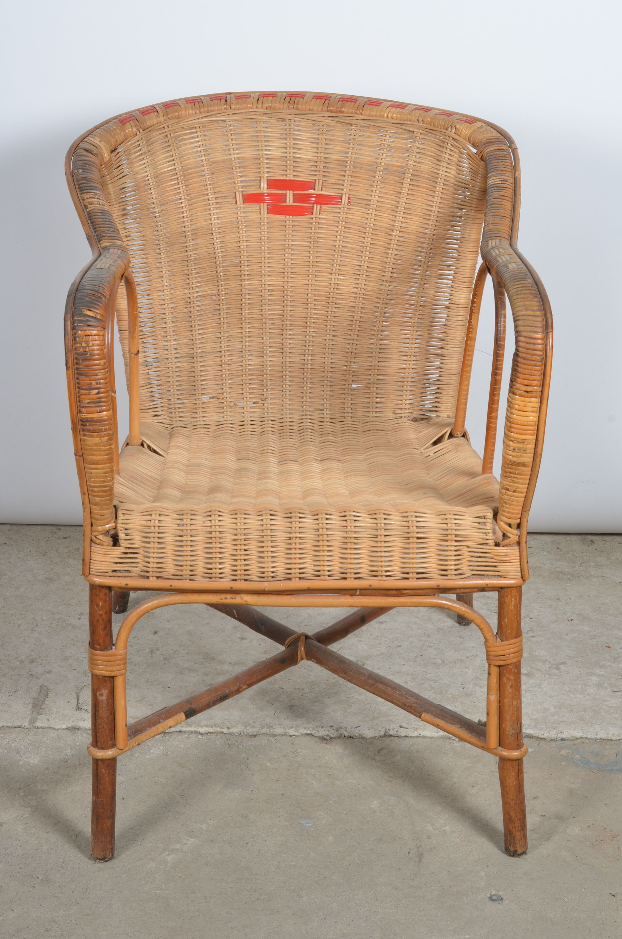 Rattan armchair and scoubidou décor