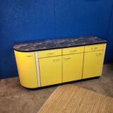 Vintage yellow sideboard, and black marble top.